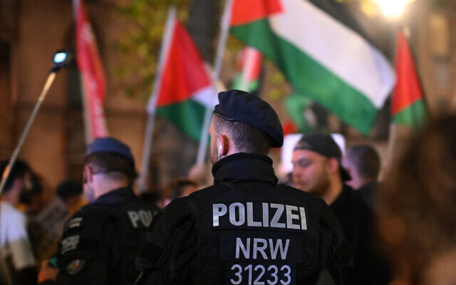 Illustrative: Riot police monitor as pro Palestinian demonstrators 'in solidarity with Gaza' hold a rally in Duisburg, western Germany, on October 9, 2023. (Ina FASSBENDER / AFP) Illustrative: Riot police monitor as pro Palestinian demonstrators 'in solidarity with Gaza' hold a rally in Duisburg, western Germany, on October 9, 2023. (Ina FASSBENDER / AFP)