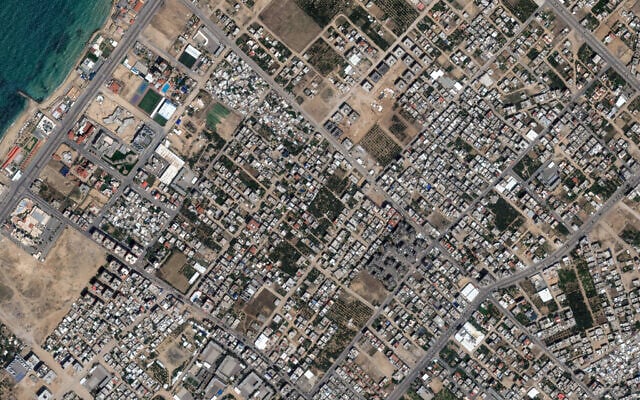 This handout satellite picture courtesy of Maxar Techonologies shows an overview of Al Karameh neighborhood in Gaza Strip on May 10, 2023. (Satellite image ©2023 Maxar Technologies / AFP) This handout satellite picture courtesy of Maxar Techonologies shows an overview of Al Karameh neighborhood in Gaza Strip on May 10, 2023. (Satellite image ©2023 Maxar Technologies / AFP)