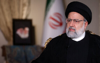 A handout picture provided by Iran's presidency on October 28, 2023, shows Iranian President Ebrahim Raisi during an interview with the Qatari state-owned television network Al-Jazeera, in Tehran. (Handout/ Iranian Presidency/ AFP)
