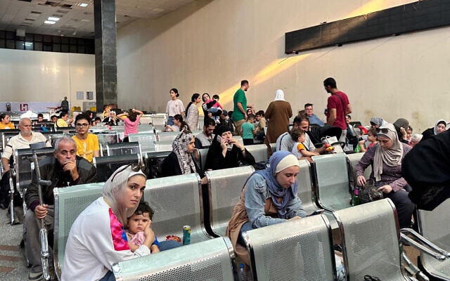 Foreign passport holders arrive in the Egyptian part of the Rafah border crossing with the Gaza Strip on November 1, 2023 (AFP) Foreign passport holders arrive in the Egyptian part of the Rafah border crossing with the Gaza Strip on November 1, 2023 (AFP)