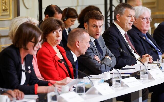 French President Emmanuel Macron (C) speaks with French diplomatic advisor to French President, Emmanuel Bonne (C-L) next to French Foreign and European Affairs Minister Catherine Colonna (2L) and Commissioner general of UNRWA Philippe Lazzarini (2R) during an international humanitary conference for civilians in Gaza, at the Elysee Presidential Palace, in Paris, on November 9, 2023. (Ludovic Marin / POOL / AFP) French President Emmanuel Macron (C) speaks with French diplomatic advisor to French President, Emmanuel Bonne (C-L) next to French Foreign and European Affairs Minister Catherine Colonna (2L) and Commissioner general of UNRWA Philippe Lazzarini (2R) during an international humanitary conference for civilians in Gaza, at the Elysee Presidential Palace, in Paris, on November 9, 2023. (Ludovic Marin / POOL / AFP)