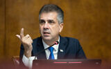 File: Then-Foreign Minister Eli Cohen speaks during a press conference at the European Office of the United Nations, Palais des Nation, in Geneva on November 14, 2023. (Pierre Albouy / AFP)