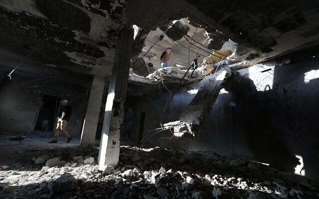 Palestinians inspect the damage after an overnight Israeli strike on the refugee camp of Balata, east of Nablus in the West Bank on November 18, 2023 (Jaafar ASHTIYEH / AFP)