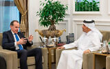 A handout picture released by the official Qatari news agency (QNA) shows Qatari Foreign Minister Mohammed bin Abdulrahman bin Jassim al-Thani (R) meeting with US National Security Council Coordinator for the Middle East and North Africa Brett McGurk in Doha on November 19, 2023. (Qatar News Agency / AFP)