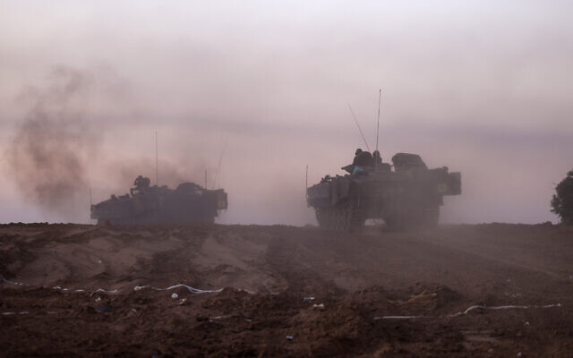 Illustrative: Israeli troops patrol on the southern border with the Gaza Strip on November 29, 2023. (Menahem Kahana/AFP) Illustrative: Israeli troops patrol on the southern border with the Gaza Strip on November 29, 2023. (Menahem Kahana/AFP)