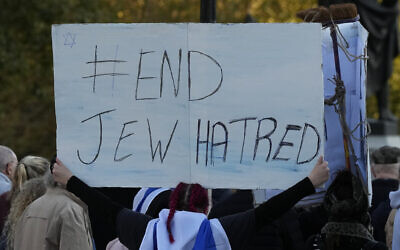 FILE - An Israel supporter holds up a placard saying 'End Jew Hatred' during a rally at Trafalgar Square, London, on October 22, 2023, amid the Gaza war. (AP Photo/Frank Augstein, File)