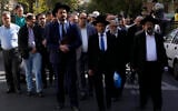 Iranian rabbis and a group of Jewish community attend a gathering to condemn Israel's attacks on Gaza in Tehran, Iran, October 30, 2023. (AP Photo/Vahid Salemi)