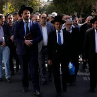 Iranian rabbis and a group of Jewish community attend a gathering to condemn Israel's attacks on Gaza in Tehran, Iran, October 30, 2023. (AP Photo/Vahid Salemi)