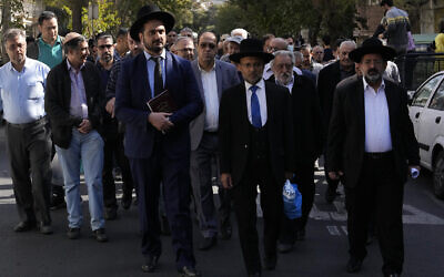 Iranian rabbis and a group of Jewish community attend a gathering to condemn Israel's attacks on Gaza in Tehran, Iran, October 30, 2023. (AP Photo/Vahid Salemi)