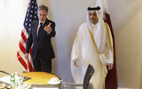 US Secretary of State Antony Blinken, left, meets with Qatari Prime Minister and Minister of Foreign Affairs Sheikh Mohammed bin Abdulrahman bin Jassim Al-Thani at a hotel during a day of meetings, amid the ongoing conflict between Israel and Hamas, in Amman, Jordan, November 4, 2023. (Jonathan Ernst/ Pool Photo via AP)