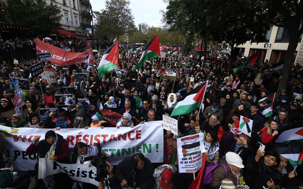 Protesters chant slogans as they march on Paris during a pro-Palestinian, anti-Israel demonstration, November 4, 2023. (AP Photo/Aurelien Morissard)