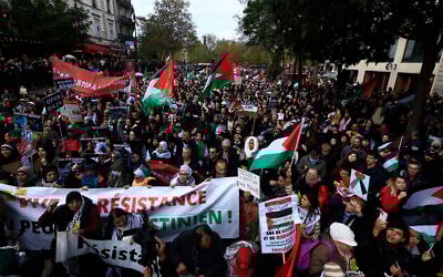 Protesters chant slogans as they march on Paris during a pro-Palestinian, anti-Israel demonstration, November 4, 2023. (AP Photo/Aurelien Morissard)