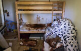 Blood is seen splattered in a child's room following the October 7 Hamas massacre, at Kibbutz Nir Oz, October 19, 2023. (AP Photo/Francisco Seco)