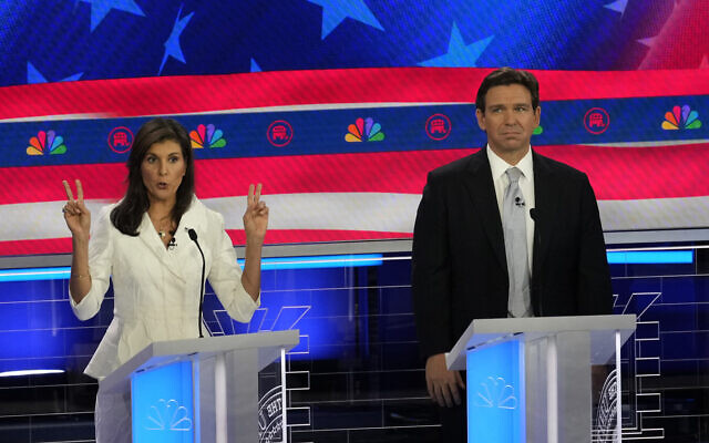 Republican presidential candidate former UN Ambassador Nikki Haley speaks as Florida Gov. Ron DeSantis listens during a Republican presidential primary debate hosted by NBC News, at the Adrienne Arsht Center for the Performing Arts of Miami-Dade County in Miami, November 8, 2023. (Rebecca Blackwell/AP) Republican presidential candidate former UN Ambassador Nikki Haley speaks as Florida Gov. Ron DeSantis listens during a Republican presidential primary debate hosted by NBC News, at the Adrienne Arsht Center for the Performing Arts of Miami-Dade County in Miami, November 8, 2023. (Rebecca Blackwell/AP)
