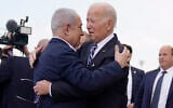 US President Joe Biden is greeted by Prime Minister Benjamin Netanyahu after arriving at Ben Gurion International Airport, October 18, 2023, in Tel Aviv. (AP Photo/Evan Vucci)