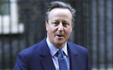 Britain's former prime minister David Cameron leaves Downing Street, in London, Nov. 13, 2023 after he was named foreign secretary. (James Manning/PA via AP)