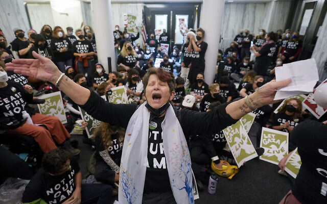 Demonstrators stage a sit-in demanding a ceasefire in the Israel-Hamas war, November 13, 2023, in Oakland, California. (AP Photo/Godofredo A. Vásquez)