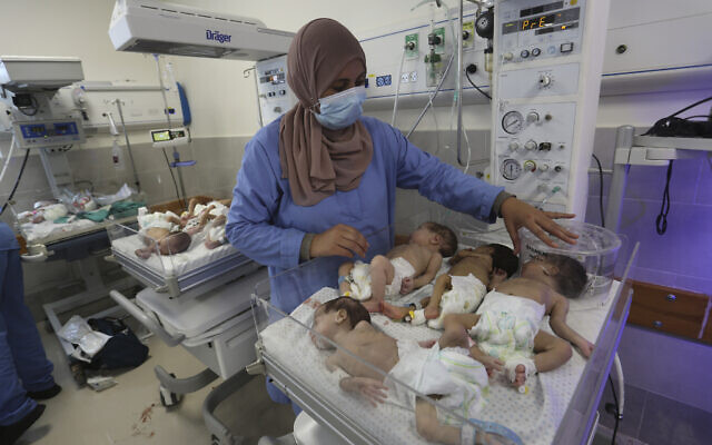 A nurse cares for prematurely born Palestinian babies that were brought from Shifa Hospital in Gaza City to the hospital in Rafah, Gaza Strip, Nov. 19, 2023. (AP Photo/Hatem Ali) A nurse cares for prematurely born Palestinian babies that were brought from Shifa Hospital in Gaza City to the hospital in Rafah, Gaza Strip, Nov. 19, 2023. (AP Photo/Hatem Ali)
