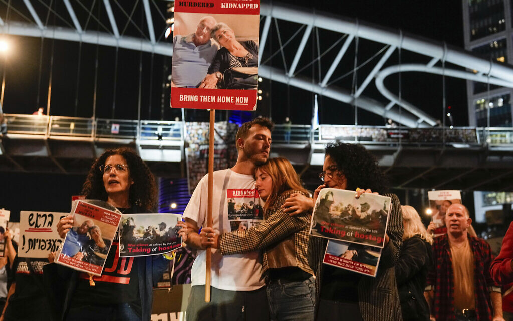 Families and friends of about 240 hostages held by Hamas in Gaza call for Prime Minister Benjamin Netanyahu to bring them home during a demonstration in Tel Aviv on November 21, 2023. (AP Photo/Ariel Schalit) Families and friends of about 240 hostages held by Hamas in Gaza call for Prime Minister Benjamin Netanyahu to bring them home during a demonstration in Tel Aviv on November 21, 2023. (AP Photo/Ariel Schalit)
