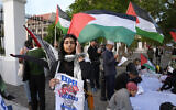 Pro-Palestinian supporters protest against Israel outside parliament in Cape Town, South Africa, November 21, 2023. (AP Photo/Nardus Engelbrecht)