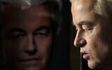 Geert Wilders, leader of the Party for Freedom, known as PVV, answers questions to media after announcement of the first preliminary results of general elections in The Hague, Netherlands, November 22, 2023. (AP Photo/Peter Dejong)