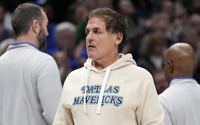 Dallas Mavericks team owner Mark Cuban walks to his seat during the first half of an NBA basketball game against the Houston Rockets in Dallas, November 28, 2023. (AP Photo/Tony Gutierrez) Dallas Mavericks team owner Mark Cuban walks to his seat during the first half of an NBA basketball game against the Houston Rockets in Dallas, November 28, 2023. (AP Photo/Tony Gutierrez)