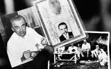 A federal police agent holds two photos and the identity card found in the house in which the man believed to be Nazi war criminal Josef Mengele lived, June 7, 1985. Photo on left shows Mengele eating. Photo on right shows Mengele during a picnic with friends and in the middle is the identity card. (AP Photo)
