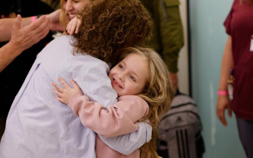 Emilia Alony, 5, is reunited with her grandmother after she was held hostage in Gaza, November 25, 2023. (Schneider Children's Hospital)