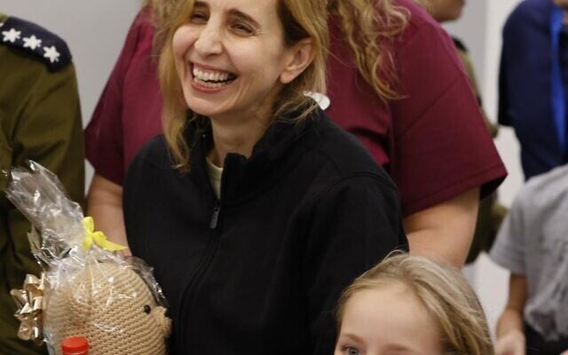 Danielle Alony and daughter Emilia, 5, are reunited with family after their release from Gaza, November 25, 2023 (Schneider Children's Hospital)