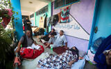 Palestinians at an UNRWA school in Khan Younis, in the southern Gaza Strip, on October 14, 2023. (Atia Mohammed/Flash90)