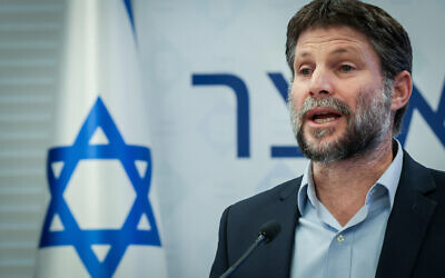 Finance Minister Bezalel Smotrich attends a press conference in Jerusalem on October 19, 2023. (Noam Revkin Fenton/Flash90)