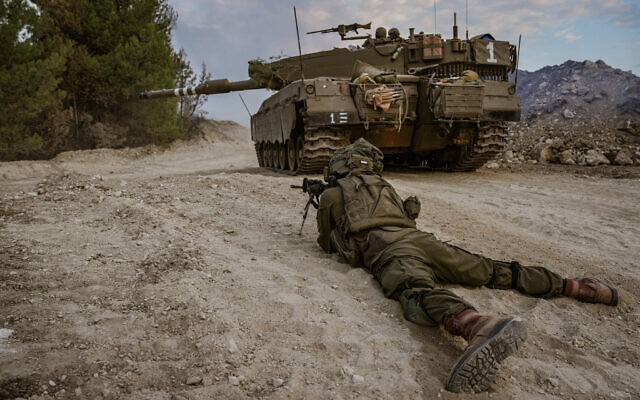 Israeli soldiers patrol near the Israeli border with Lebanon, November 1, 2023. (Ayal Margolin/Flash90) Israeli soldiers patrol near the Israeli border with Lebanon, November 1, 2023. (Ayal Margolin/Flash90)