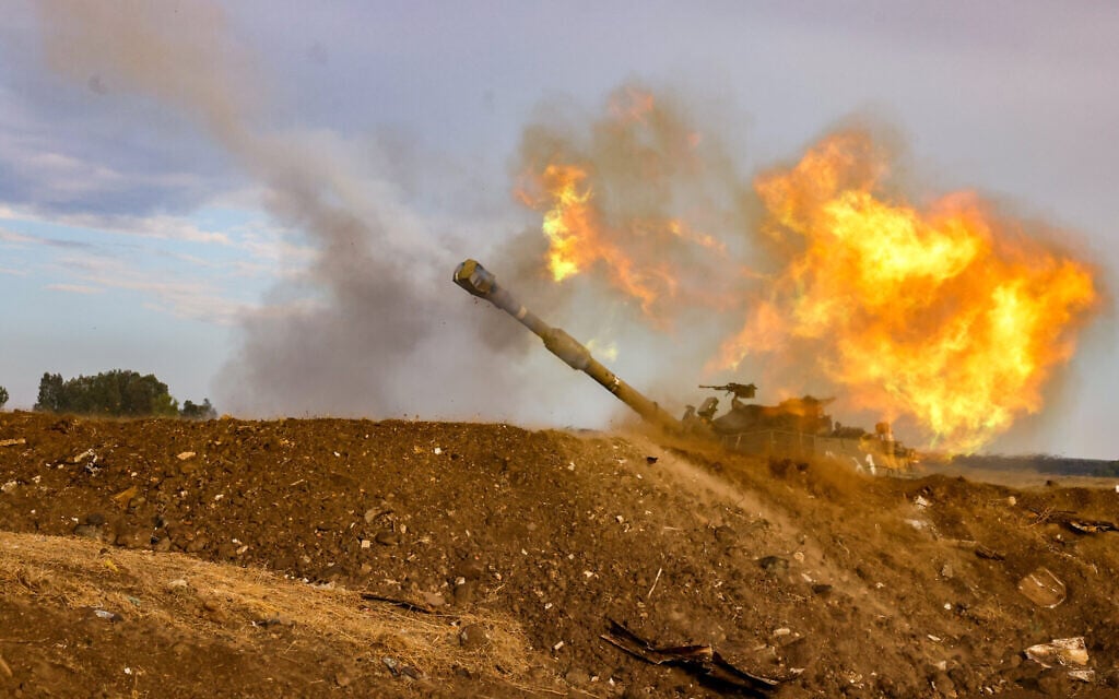 An IDF artillery unit fires towards Lebanon near the Israeli border with Lebanon, northern Israel, November 2, 2023. (David Cohen/Flash90)