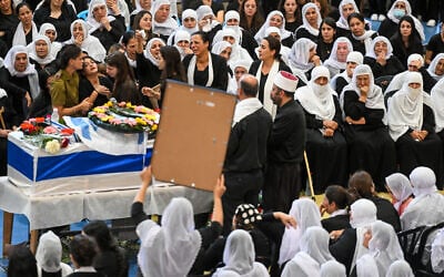 Family and friends of Lt. Col. Salman Habaka mourn at his funeral at the Druze village of Yanuh-Jat, northern Israel, on November 3, 2023. (Flash90) Family and friends of Lt. Col. Salman Habaka mourn at his funeral at the Druze village of Yanuh-Jat, northern Israel, on November 3, 2023. (Flash90)