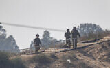 Israeli soldiers seen near the border with the Gaza Strip, in southern Israel, on November 3, 2023. (Yonatan Sindel/Flash90)