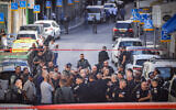 Security forces at the scene of a stabbing attack outside a police station near the Old City of Jerusalem, November 6, 2023. (Chaim Goldberg/Flash90)