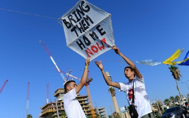 Surviving Kibbutz Kfar Aza residents hold their annual kite event in Tel Aviv on November 9, 2023, after the October 7 Hamas massacre in the Gaza border communities. (Tomer Neuberg/Flash 90)