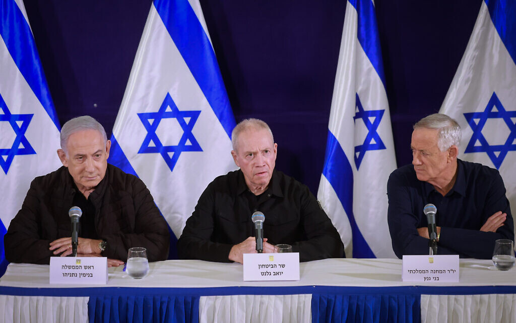 (From left) Prime Minister Benjamin Netanyahu, Defense Minister Yoav Gallant and Minister Benny Gantz hold a joint press conference at the Ministry of Defense, in Tel Aviv, on November 11, 2023. (Marc Israel Sellem/POOL)