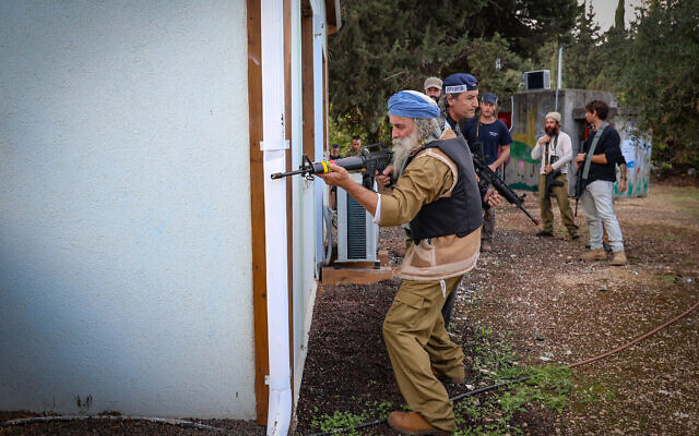 Members of the emergency squad of Moshav Amuka seen during a drill in Moshav Amuka, northern Israel, November 15, 2023. (David Cohen/Flash90) Members of the emergency squad of Moshav Amuka seen during a drill in Moshav Amuka, northern Israel, November 15, 2023. (David Cohen/Flash90)