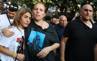 Parents of soldier Noa Marciano, who was killed in Hamas captivity, comforted by families of those held hostage by Hamas terrorists in Gaza, on November 16, 2023. (Jonathan Shaul/Flash90) Parents of soldier Noa Marciano, who was killed in Hamas captivity, comforted by families of those held hostage by Hamas terrorists in Gaza, on November 16, 2023. (Jonathan Shaul/Flash90)