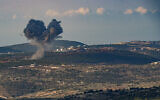 File: Smoke rises during an exchange of fire between the IDF and terrorists from the Hezbollah organization on the border between Israel and Lebanon, November 18, 2023. (Ayal Margolin/Flash90)