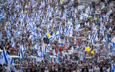 Families of Israelis held hostage by Hamas terrorists in Gaza march with 30,000 supporters toward the Prime Minister's Office in Jerusalem, as part of a protest calling for the immediate release of the hostages, at the entrance to Jerusalem, November 18, 2023. (Yonatan Sindel/Flash90)