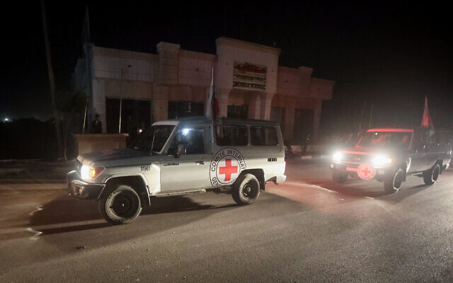 International Red Cross vehicles reportedly carrying Israeli hostages released by the Hamas terror group as part of an agreement including the release of Palestinian prisoners, cross the Rafah border point in the Gaza Strip on the way to Egypt on November 24, 2023. (Atia Mohammed/Flash90) International Red Cross vehicles reportedly carrying Israeli hostages released by the Hamas terror group as part of an agreement including the release of Palestinian prisoners, cross the Rafah border point in the Gaza Strip on the way to Egypt on November 24, 2023. (Atia Mohammed/Flash90)