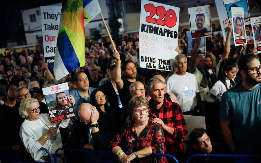 Israelis attend a rally calling for the release of Israelis held hostage in Gaza, in Tel Aviv, November 25, 2023. (Miriam Alster/Flash90) Israelis attend a rally calling for the release of Israelis held hostage in Gaza, in Tel Aviv, November 25, 2023. (Miriam Alster/Flash90)
