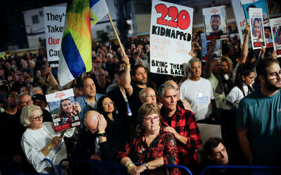 Israelis attend a rally calling for the release of Israelis held hostage in Gaza, in Tel Aviv, November 25, 2023. (Miriam Alster/Flash90)