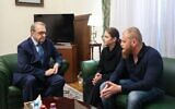 Relatives of released Israeli-Russian hostage Roni Krivoi meet in Russia with Deputy Foreign Affairs Minister Mikhail Bogdanov, on November 27, 2023. (Russian Foreign Ministry, used in accordance with clause 27a of the Copyright Law)