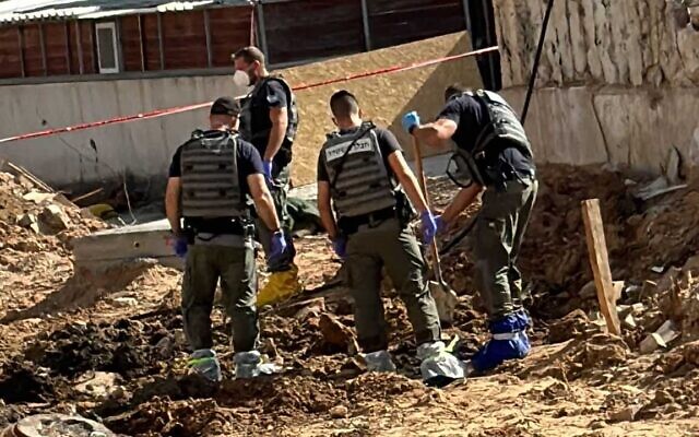 Officials at the site of the Sderot police station where the body of a Hamas terrorist was found on November 23, 2023. (Sderot Municipality) Officials at the site of the Sderot police station where the body of a Hamas terrorist was found on November 23, 2023. (Sderot Municipality)