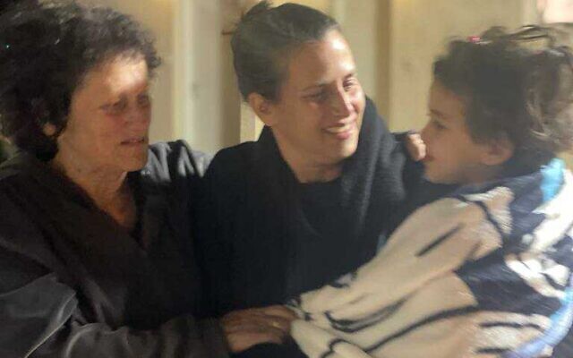 Avigail Idan reunites for the first time with her aunt Liron and her grandmother Shlomit after her release from Hamas captivity on November 26, 2023, at the Hatzerim Air Base. (Courtesy) Avigail Idan reunites for the first time with her aunt Liron and her grandmother Shlomit after her release from Hamas captivity on November 26, 2023, at the Hatzerim Air Base. (Courtesy)