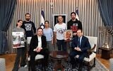 US billionaire Elon Musk meets with Israeli President Isaac Herzog and representatives of families of hostages held in Gaza during his visit to Israel, November 27, 2023. (Haim Zach/GPO)