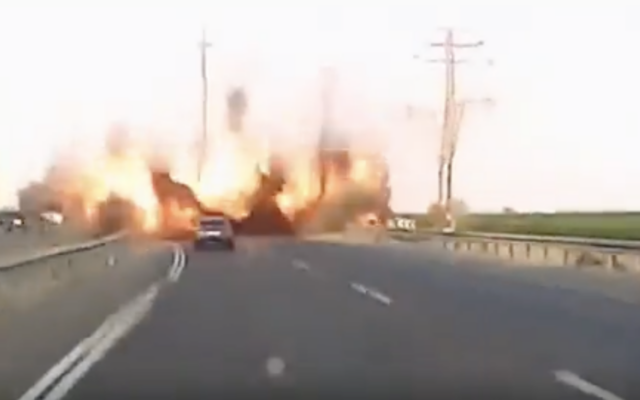 Dashcam footage shows the moment a rocket directly hit the Route 4 highway near Ashdod, October 31, 2023 (Screen grab used in accordance with Clause 27a of the Copyright Law) Dashcam footage shows the moment a rocket directly hit the Route 4 highway near Ashdod, October 31, 2023 (Screen grab used in accordance with Clause 27a of the Copyright Law)